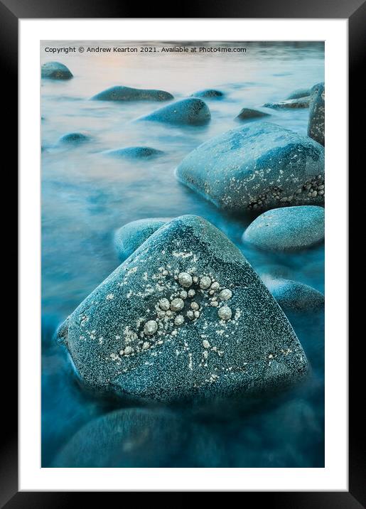 Rising tide around rocks at dusk Framed Mounted Print by Andrew Kearton