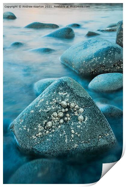Rising tide around rocks at dusk Print by Andrew Kearton