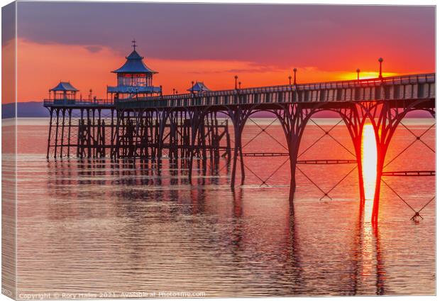 Clevedon Pier with a streak of sunlight Canvas Print by Rory Hailes