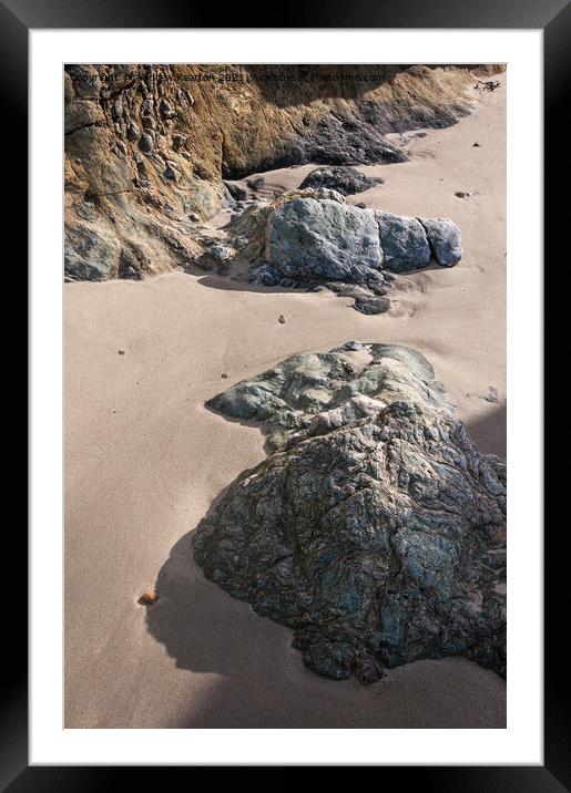 Soft sand and textured rocks Framed Mounted Print by Andrew Kearton
