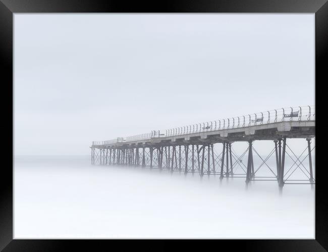 Pier into the Clouds Framed Print by Peter Richard