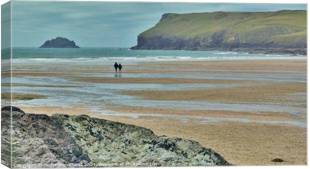 A Winter's Stroll On Polzeath Beach. Canvas Print by Neil Mottershead