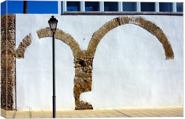 Imperfect symmetry - two brick arches Canvas Print by Jose Manuel Espigares Garc