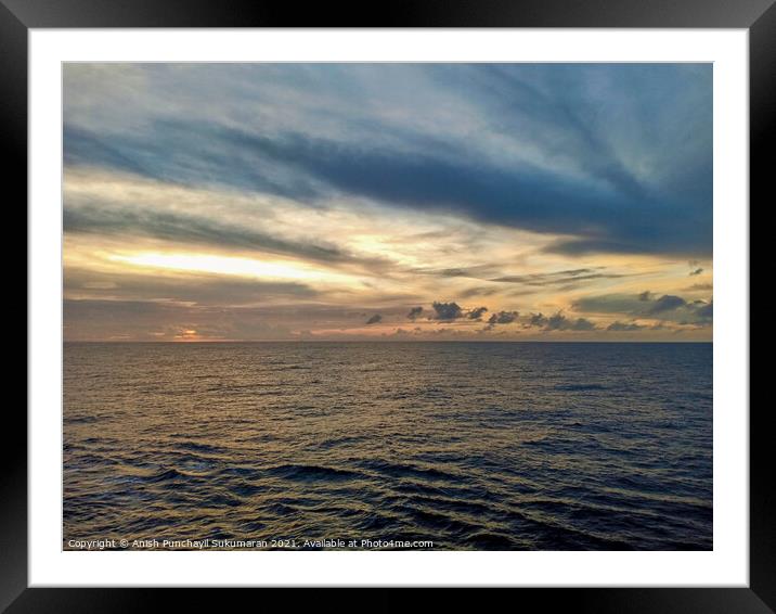 sunset in south china sea a cloudy sky Framed Mounted Print by Anish Punchayil Sukumaran