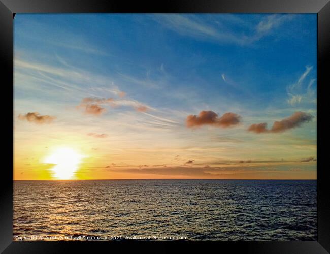 sunset and yellow sky and ocean Framed Print by Anish Punchayil Sukumaran