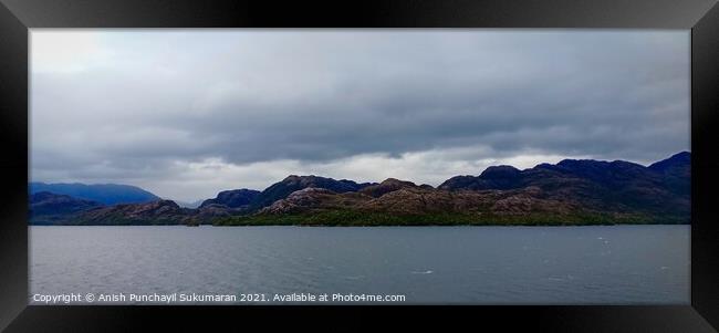 mountain cloudy sky and clam ocean Framed Print by Anish Punchayil Sukumaran