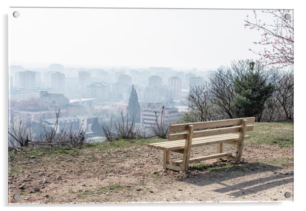 empty wooden bench in spring park over the city Acrylic by David Galindo
