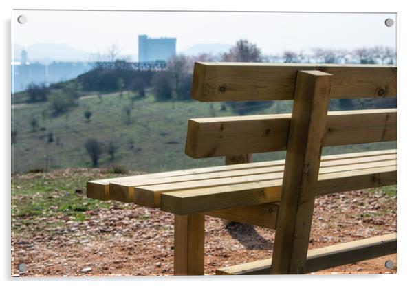 close empty wooden bench in spring park over the city Acrylic by David Galindo