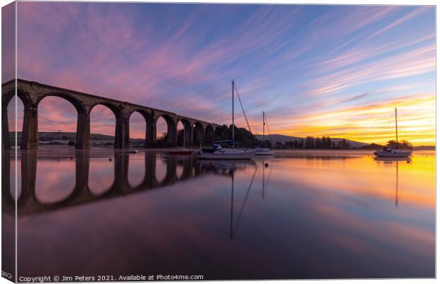 A rail bridge over river tiddy  with a Sunrise at St Germans Cornwall  Canvas Print by Jim Peters