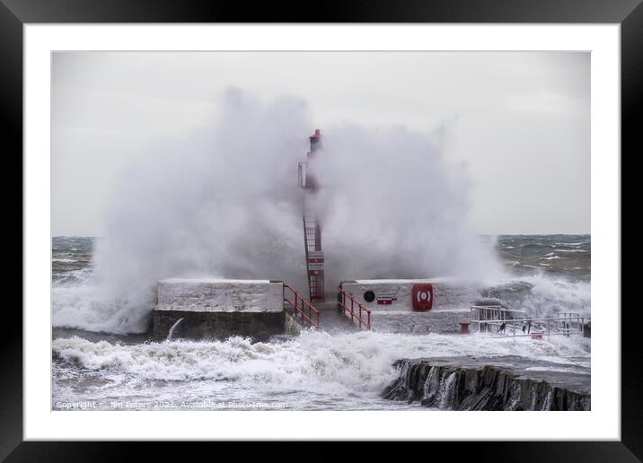 Large wave crashes over Looes banjo pier Framed Mounted Print by Jim Peters