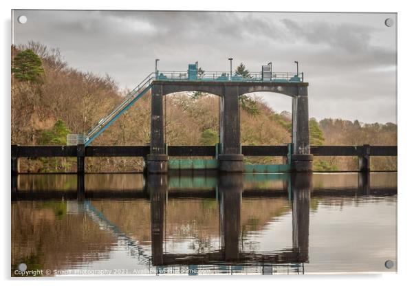 Flood gates reflecting on Earlstoun Loch at Earlstound Dam Acrylic by SnapT Photography