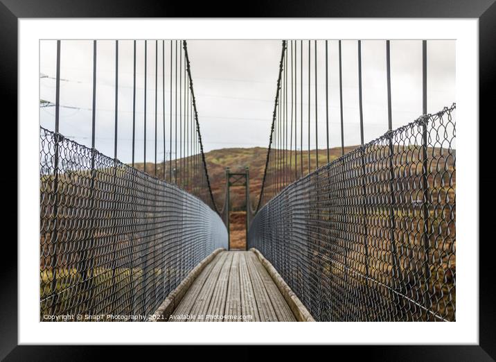 View across a wooden suspension bridge in the Scottish highlands Framed Mounted Print by SnapT Photography