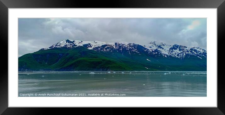 snow covered mountain and ice floating in clam sea Framed Mounted Print by Anish Punchayil Sukumaran