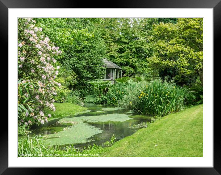 Peaceful stream and summer house Framed Mounted Print by JUDI LION