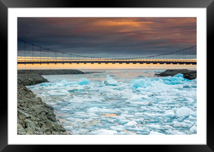 Chunks of Ice under the Bridge at sunset Framed Mounted Print by JUDI LION