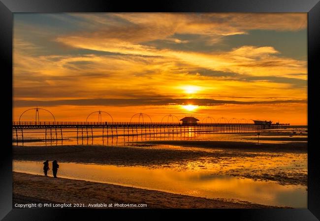 Sunset over Southport Pier  Framed Print by Phil Longfoot