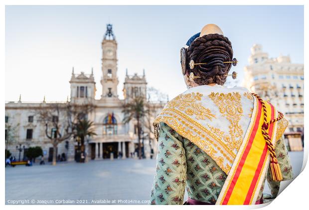Woman dressed as a Fallera with her back turned, observes the facade of the Valencia City Hall, out of focus in the background. Print by Joaquin Corbalan