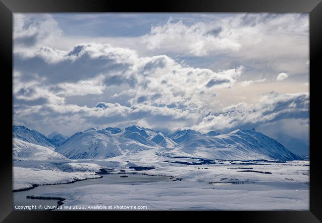 Mountains and land covered by snow in winter in New Zealand Framed Print by Chun Ju Wu