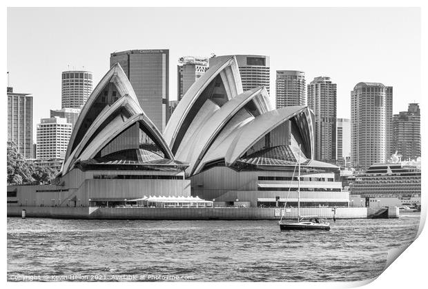 A yacht cruises by the Opera House Print by Kevin Hellon