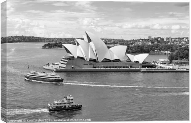 Ferries passing the Sydney Opera House Canvas Print by Kevin Hellon