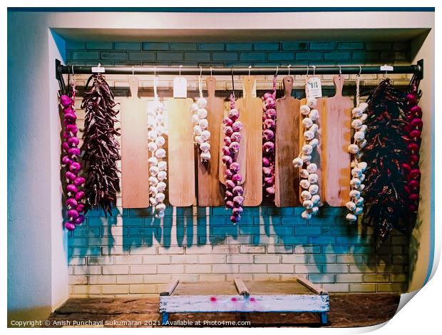 hanging display of onions garlic and red chillies Print by Anish Punchayil Sukumaran