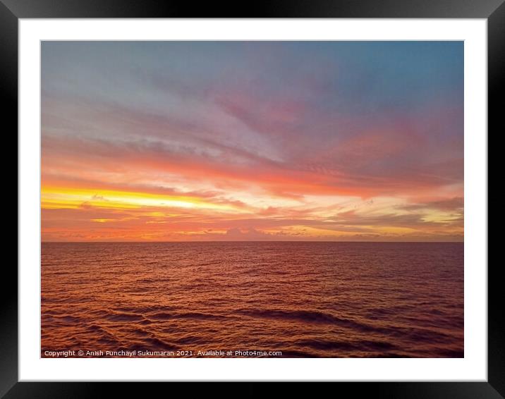 beautiful sunset in ocean and cloudy sky Framed Mounted Print by Anish Punchayil Sukumaran