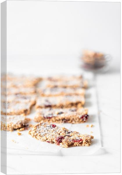 Vegan Energy Oat Bars With Coconut, Rice Puffs and Dried Cranberries Canvas Print by Radu Bercan