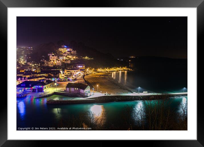 Looe beach and pier at night Framed Mounted Print by Jim Peters