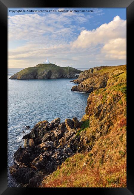 Strumble Head lighthouse at sunset, Pembrokeshire Framed Print by Andrew Kearton