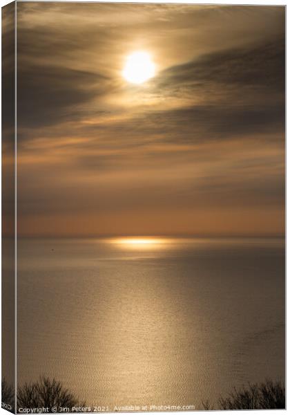 Moody sunrise in Looe Bay Canvas Print by Jim Peters