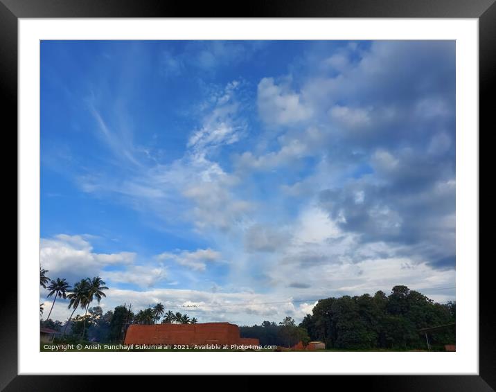 Beautiful blue sky and coconut tree ,a view from kerala  Framed Mounted Print by Anish Punchayil Sukumaran