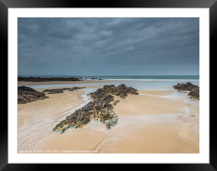 Rock formations on beach Framed Mounted Print by JUDI LION