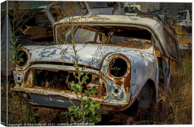 Abandoned Vintage Rusty car in junkyard Canvas Print by Rika Hodgson