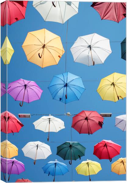 Colorful Umbrellas Canvas Print by Neil Overy