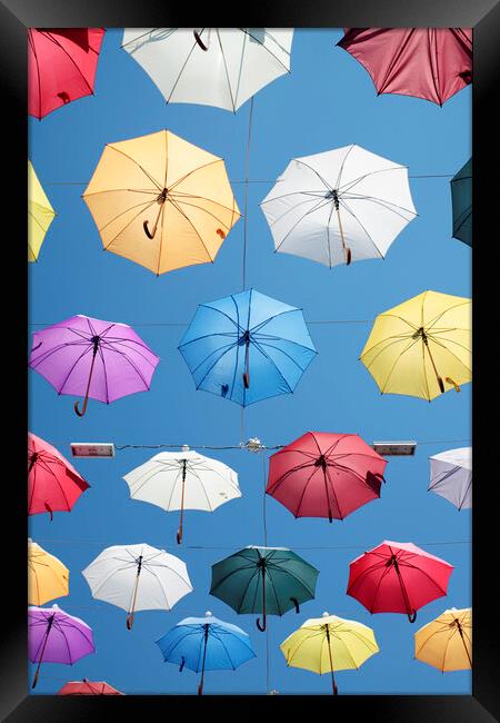 Colorful Umbrellas Framed Print by Neil Overy