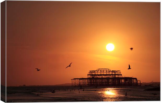 Brighton West Pier at Sunset Canvas Print by Neil Overy