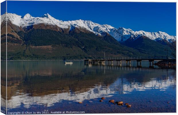 Glenorchy Wharf with reflection of snow mountains on the lake, South Island, New Zealand Canvas Print by Chun Ju Wu