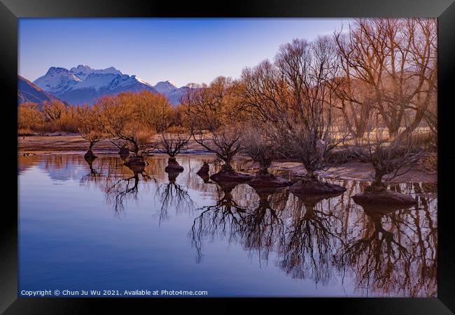 Reflection of trees on lake in winter in Glenorchy, New Zealand Framed Print by Chun Ju Wu