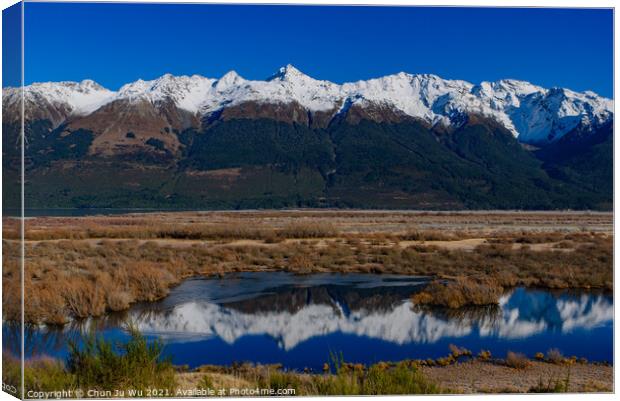 Reflection of snow mountains on lake in Glenorchy, South Island, New Zealand Canvas Print by Chun Ju Wu