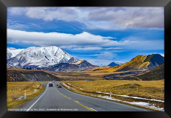 Road trip in winter with snow mountains at backgro Framed Print by Chun Ju Wu