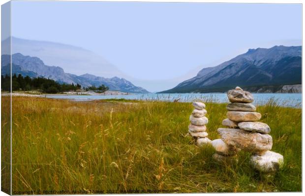 An inuksuk is a figure made of piled stones Canvas Print by PhotOvation-Akshay Thaker