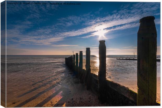 Sparkling groynes Canvas Print by Stuart C Clarke