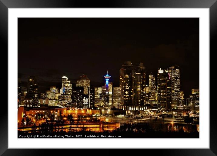 The city of Calgary's downtown skyline night view.  Framed Mounted Print by PhotOvation-Akshay Thaker