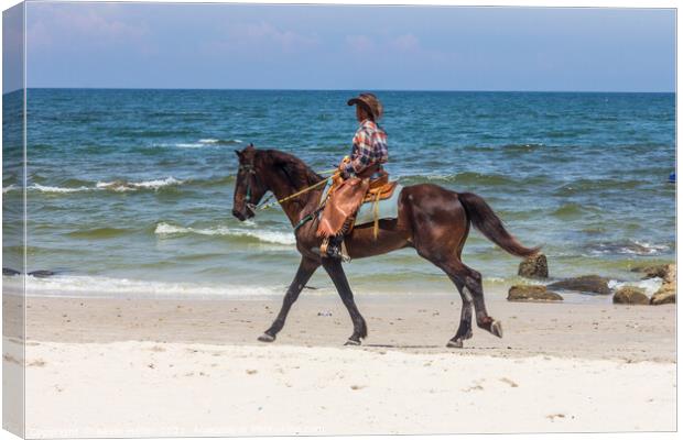 Horse and rider, Hua Hin beach, Thailand Canvas Print by Kevin Hellon