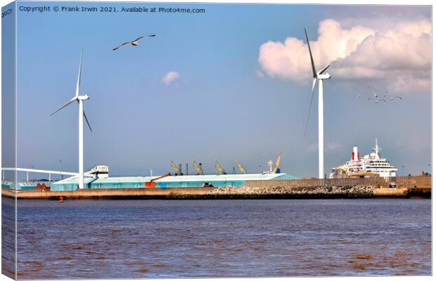 Wind turbines on North Mersey banks. Canvas Print by Frank Irwin