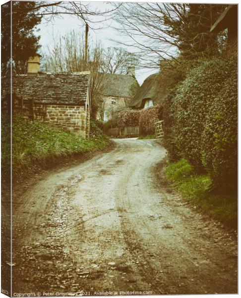 Thatched Cottages Down A Windy English Country Lane Canvas Print by Peter Greenway