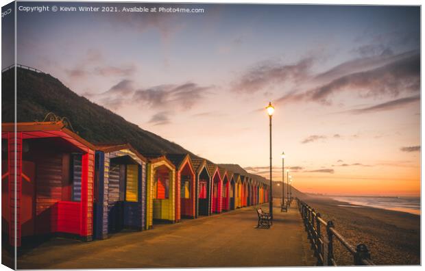 Beach Huts at sunset Canvas Print by Kevin Winter