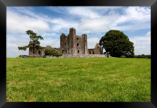 Old tiny castle in Ireland surrounded by grassy fields   Framed Print by Thomas Baker