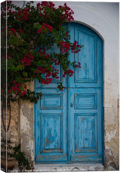 Doors on the island of Kastellorizo, Meis Canvas Print by Roger Worrall