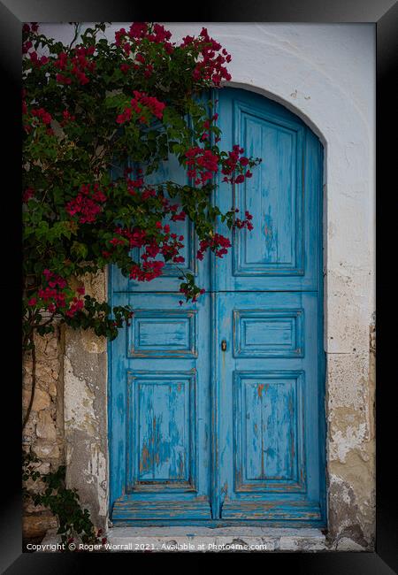 Doors on the island of Kastellorizo, Meis Framed Print by Roger Worrall